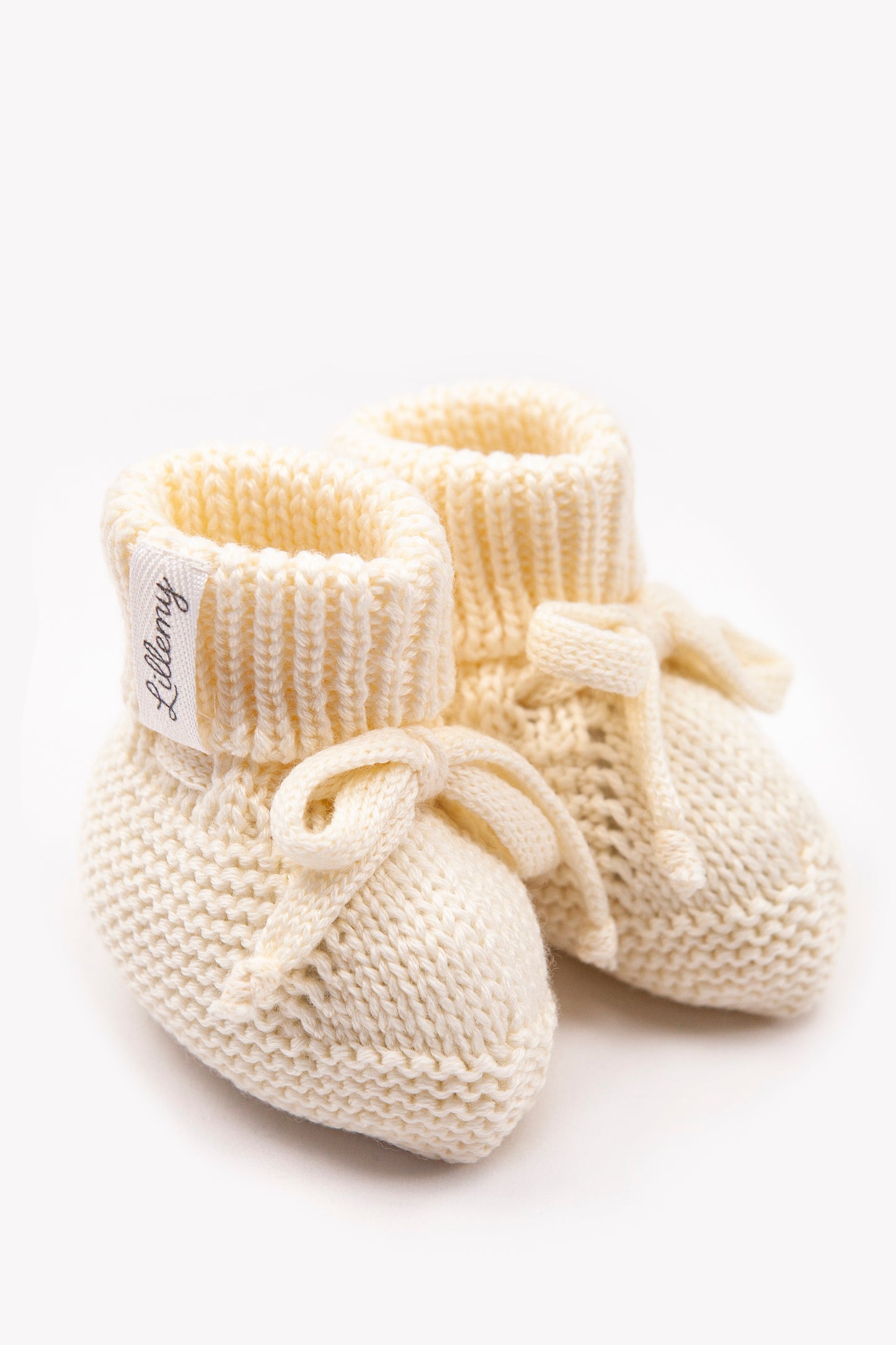 Cream merino wool baby booties – seamlessly knitted, fine Italian merino
