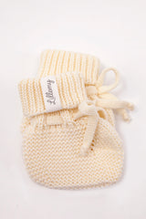 cream merino wool baby booties detail – seamless knit construction, OEKO-TEX certified