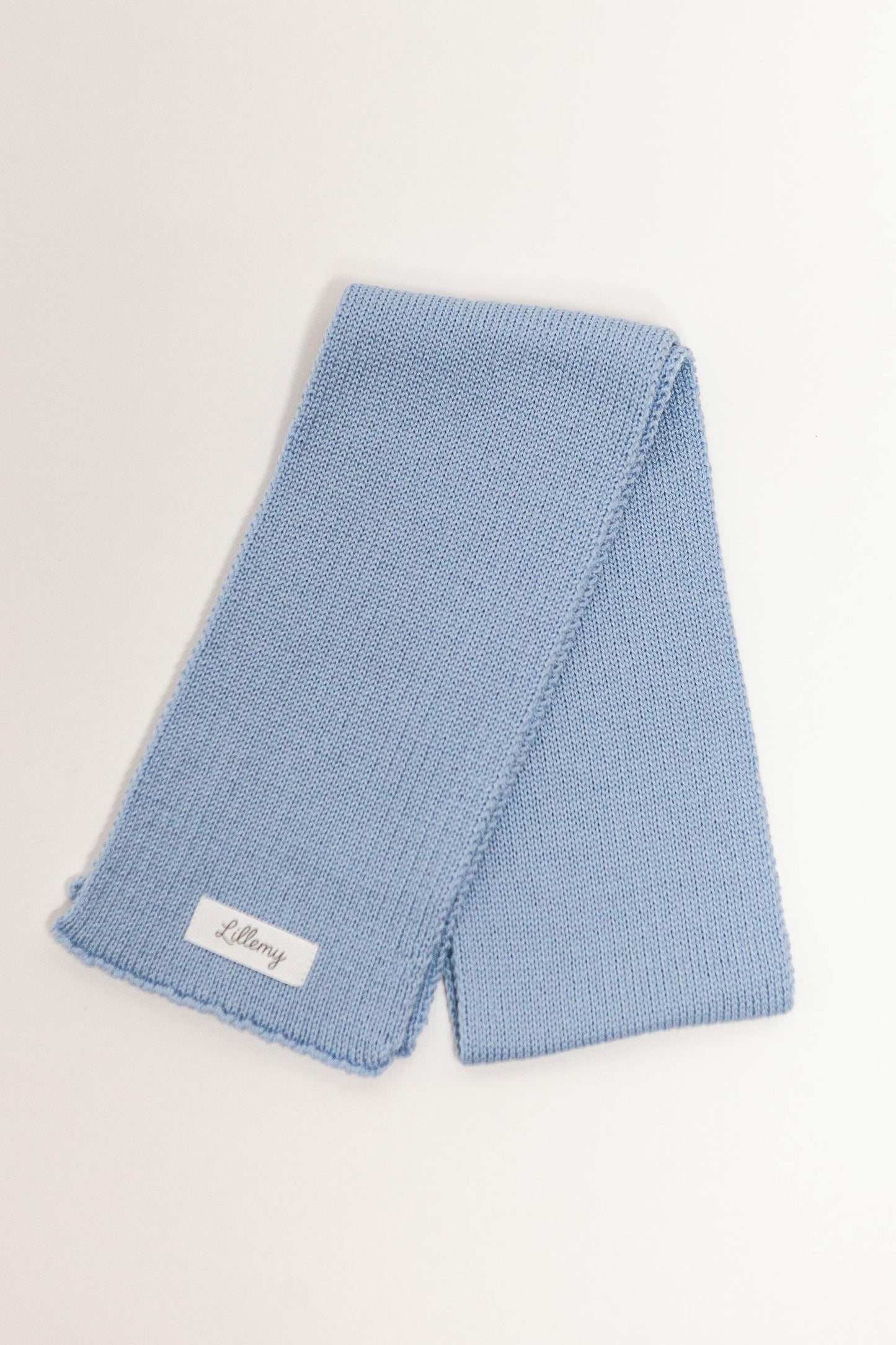 blue merino wool baby scarf worn – soft and breathable for outdoor days