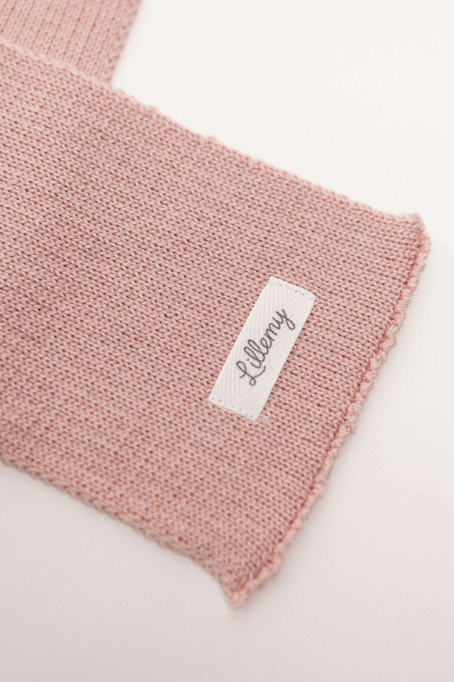 pink merino wool baby scarf worn – soft and breathable for outdoor days