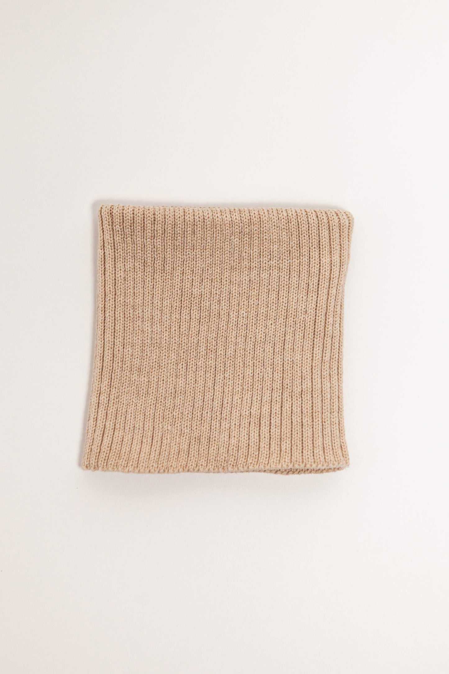 beige merino wool tube scarf worn – versatile and itch-free