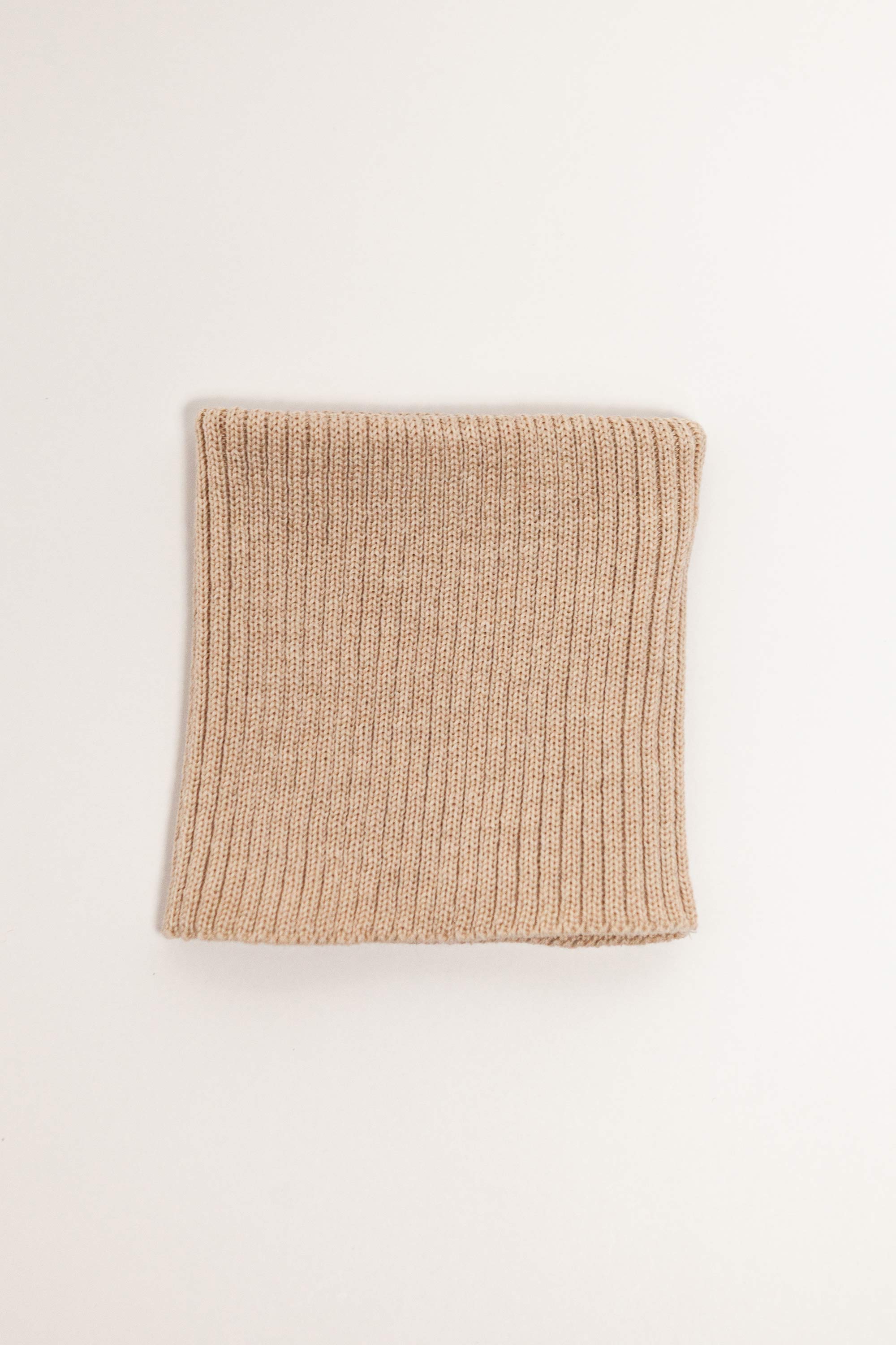 beige merino wool tube scarf worn – versatile and itch-free