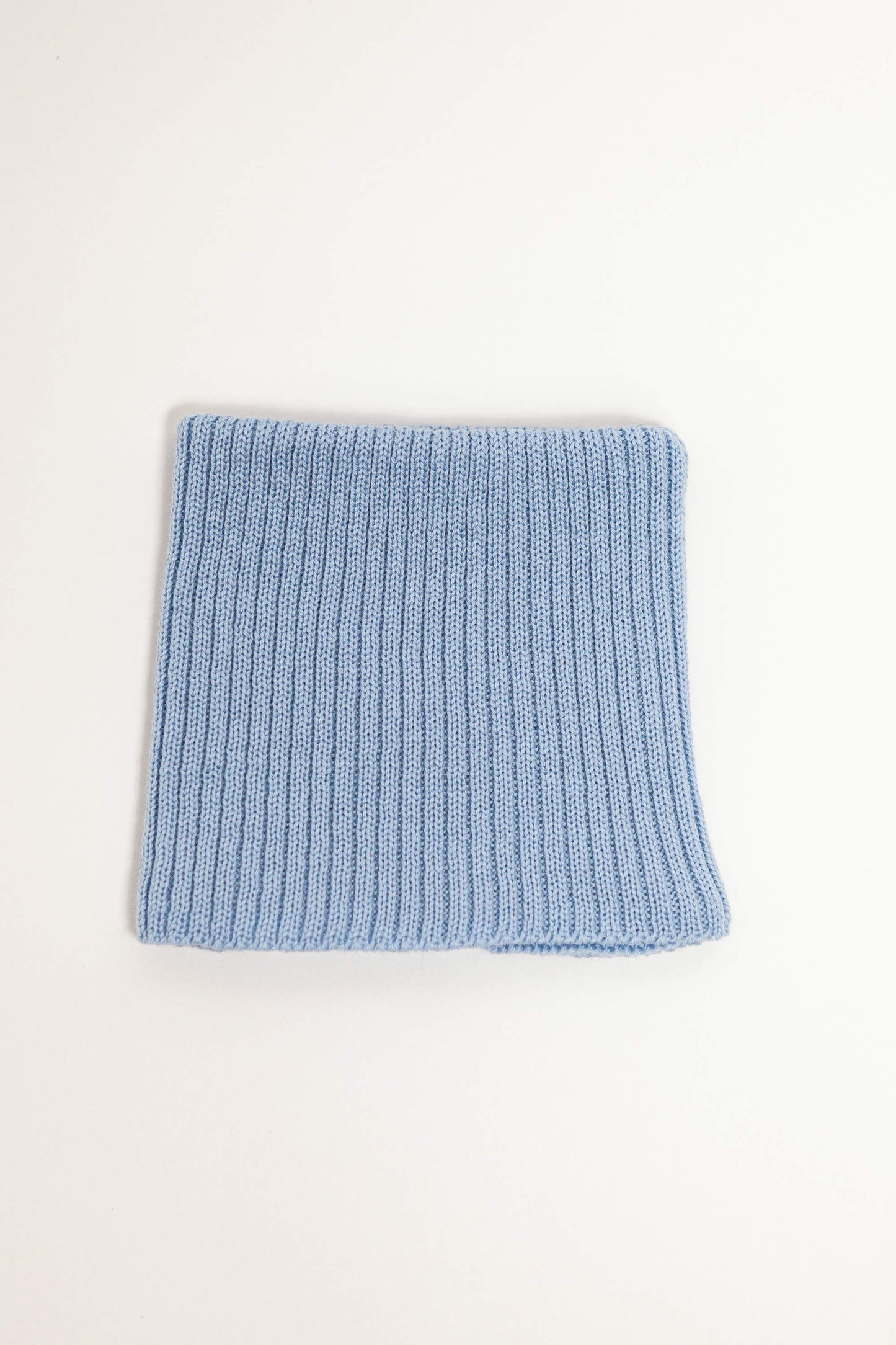 blue merino wool tube scarf worn – versatile and itch-free