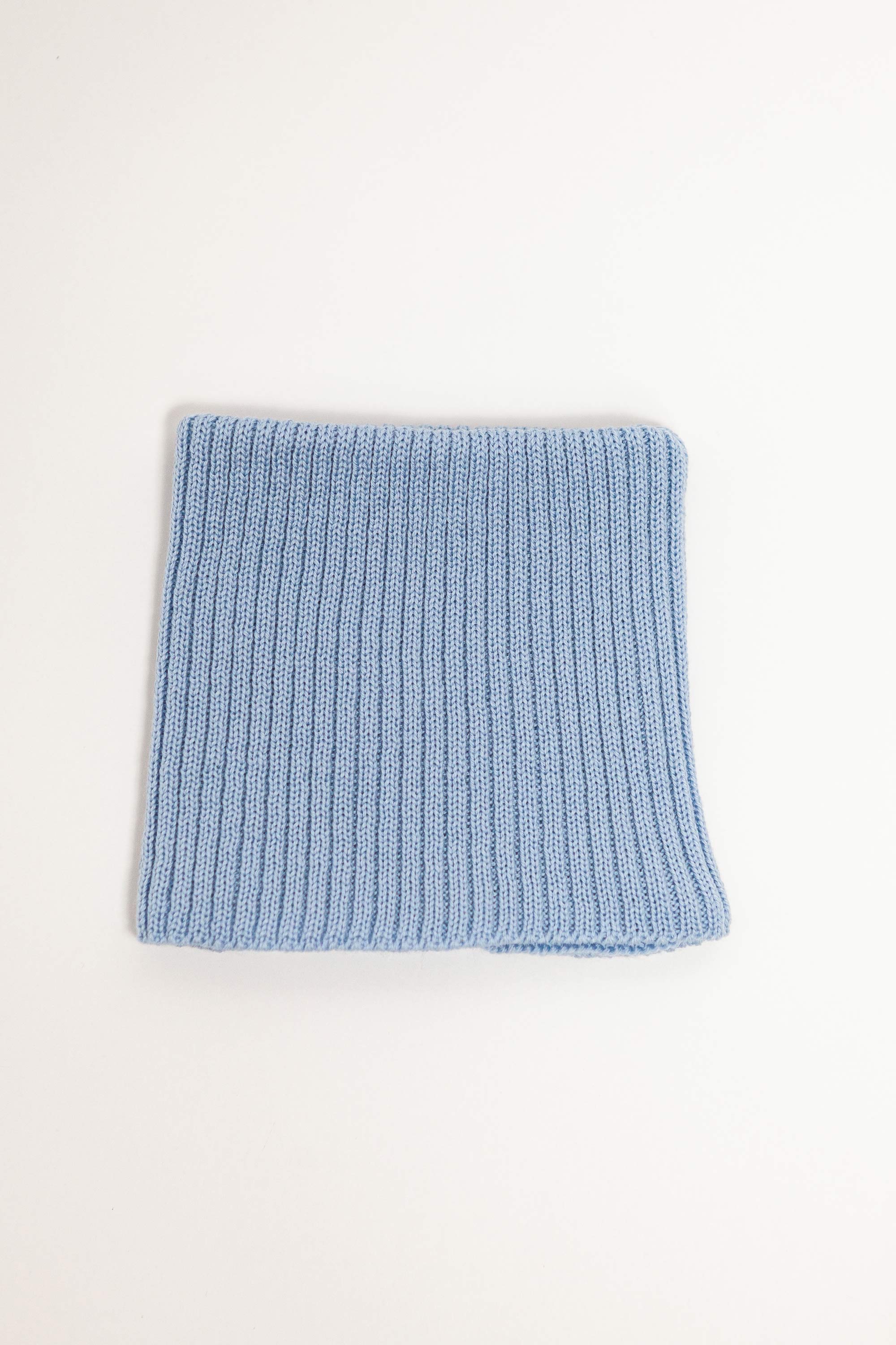blue merino wool tube scarf worn – versatile and itch-free