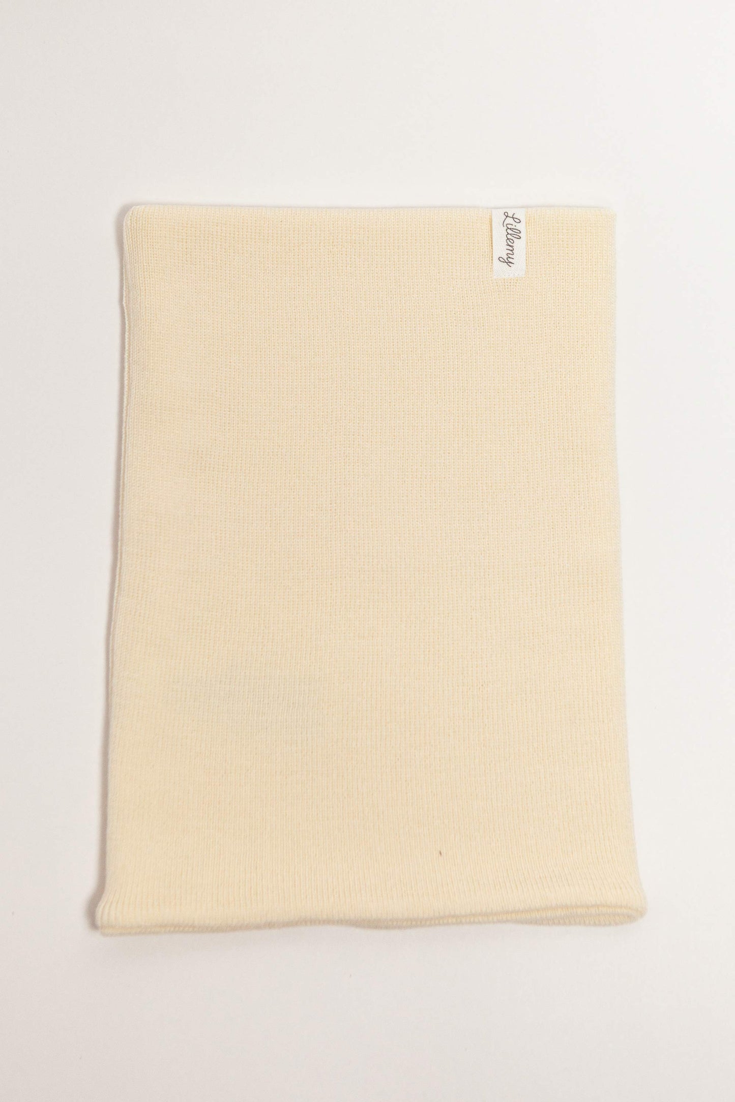 cream merino wool kids snood worn – stays in place, no tying needed